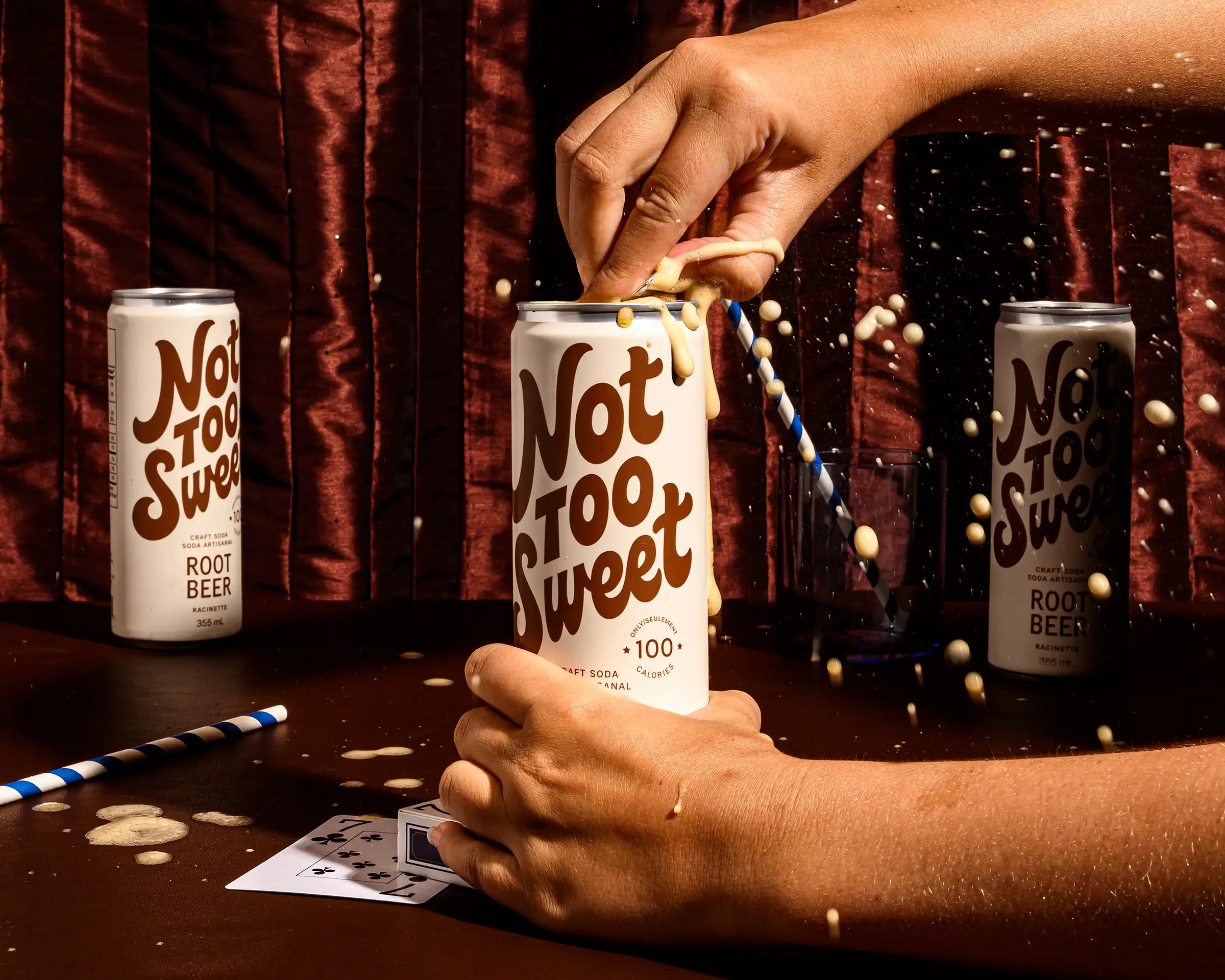 A can of Root Beer exploding as someone opens it.