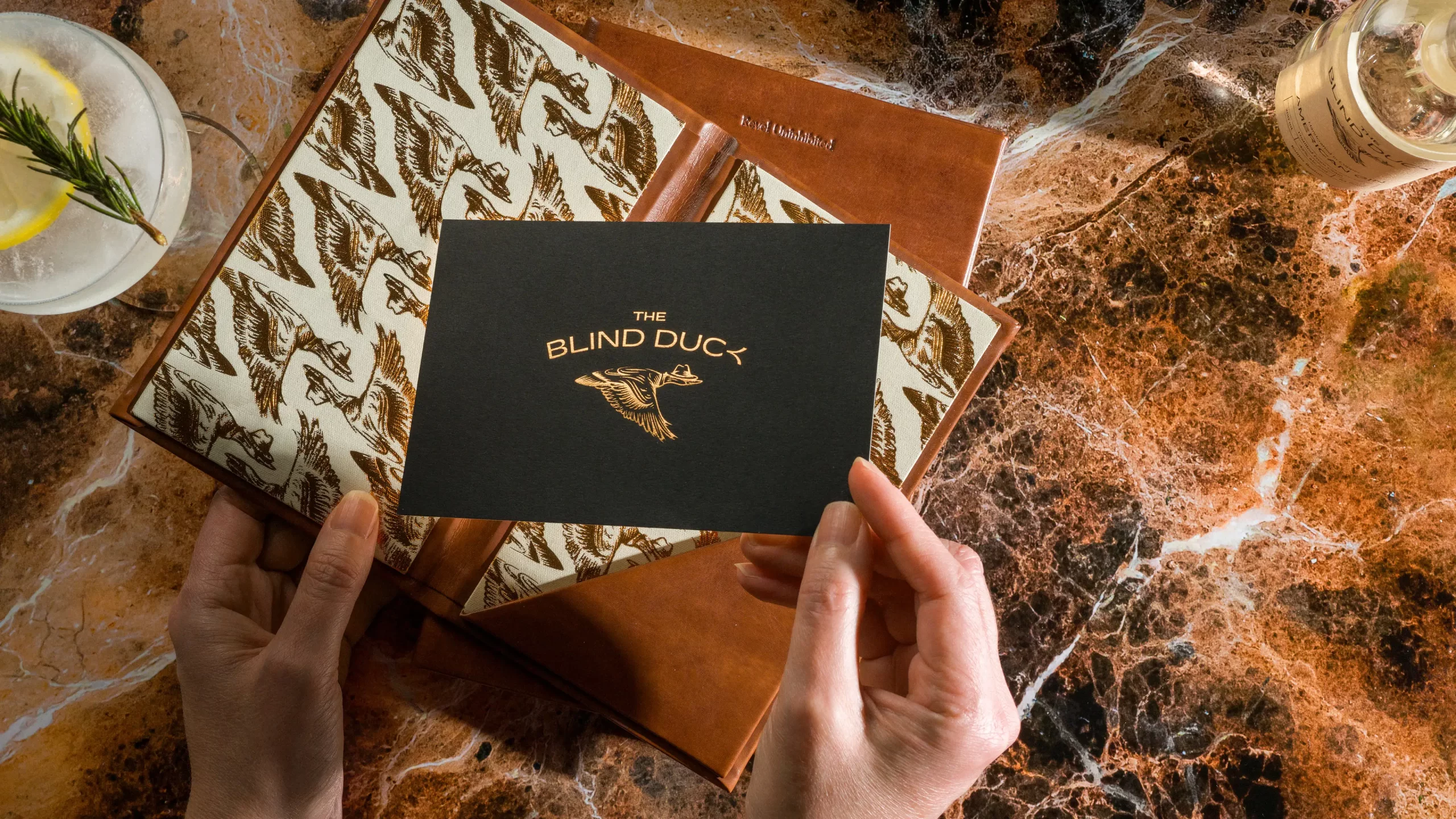 Blind Duck menu interior and brand card.